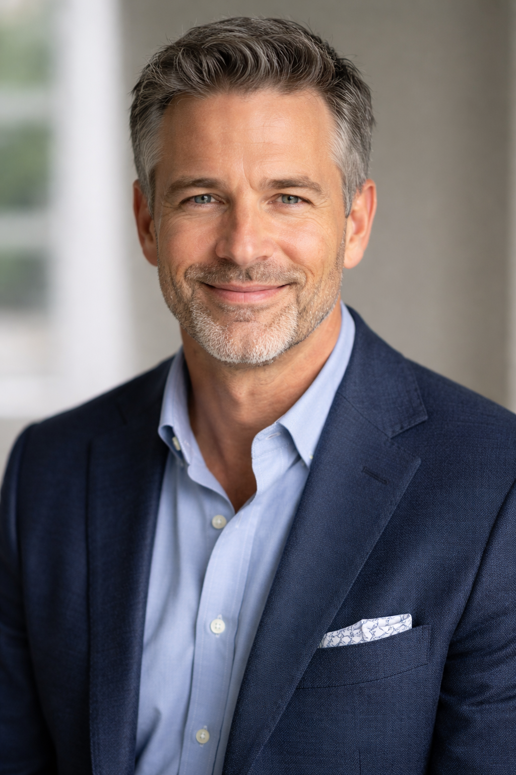 Portrait of Luis Hewitt, Director of Communications