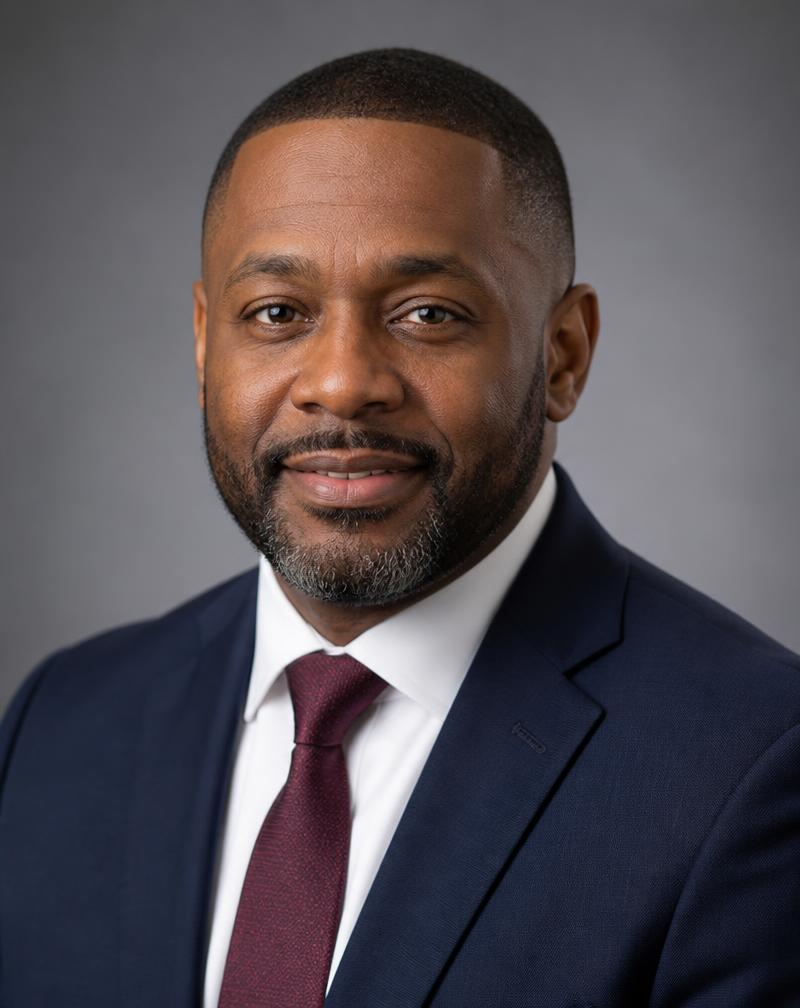 Portrait of Marcus D. Whitfield, Head of Public Policy